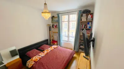 Un ou plusieurs lits dans un hébergement de l'établissement Chambre privée proche Accord Arena et avec metro 20 min de la Tour Eiffel