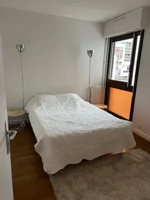 Un ou plusieurs lits dans un hébergement de l'établissement Appartement lumineux 46m2 20e