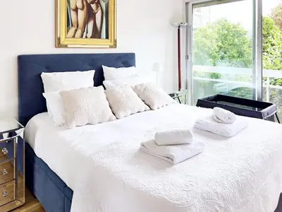 Un ou plusieurs lits dans un hébergement de l'établissement PenBed -1BR - Proche Champs Elysées