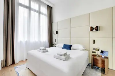 Un ou plusieurs lits dans un hébergement de l'établissement Exceptional apt with AC - 2BD-4P - Parc Monceau