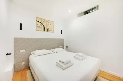 Un ou plusieurs lits dans un hébergement de l'établissement Authentic apartment - 1BR-4P - Centre Pompidou