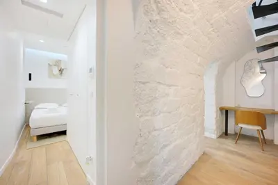 Un ou plusieurs lits dans un hébergement de l'établissement Charming apartment - 3BR-8P -Centre Pompidou