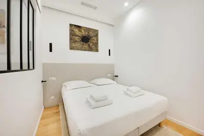 Un ou plusieurs lits dans un hébergement de l'établissement Charming apartment - 3BR-8P -Centre Pompidou