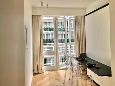 Télévision ou salle de divertissement dans l'établissement Studio confort et design Etoile-Neuilly-La Défense