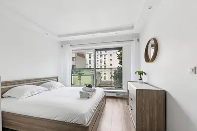 Un ou plusieurs lits dans un hébergement de l'établissement Appartement élégant et design