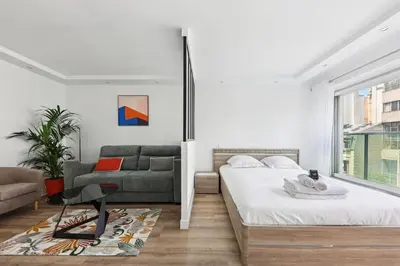 Un ou plusieurs lits dans un hébergement de l'établissement Appartement élégant et design