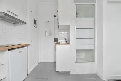 Cuisine ou kitchenette dans l'établissement L Authentique - Trocadero - 2 Prs