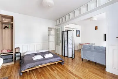 Un ou plusieurs lits dans un hébergement de l'établissement Stunning Parkview Apartment close to Paris