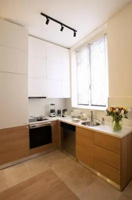 Cuisine ou kitchenette dans l'établissement Luxueux Appartement - Centre de Paris