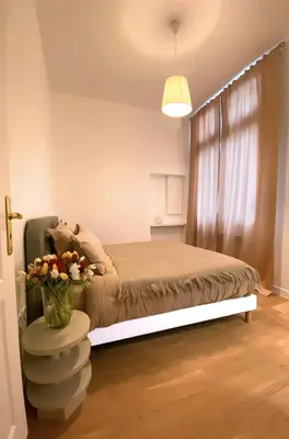 Un ou plusieurs lits dans un hébergement de l'établissement Luxueux Appartement - Centre de Paris