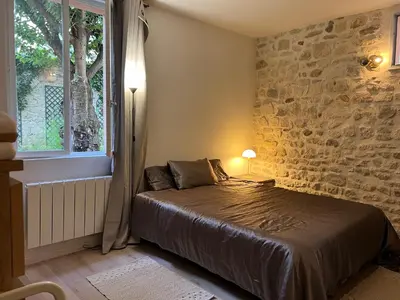 Un ou plusieurs lits dans un hébergement de l'établissement Maison Paris