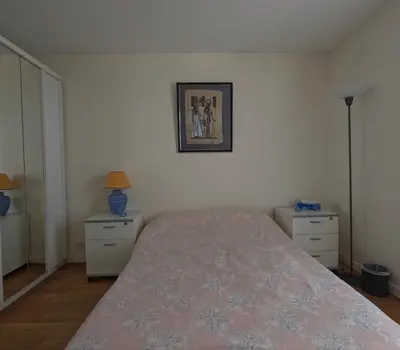 Un ou plusieurs lits dans un hébergement de l'établissement Superbe appartement Paris Courbevoie La Défense