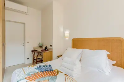 Un ou plusieurs lits dans un hébergement de l'établissement Un architecte en voyage