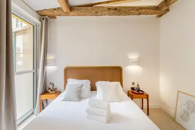 Un ou plusieurs lits dans un hébergement de l'établissement Un architecte en voyage