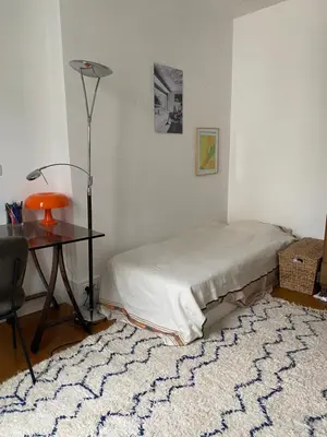 Un ou plusieurs lits dans un hébergement de l'établissement Charming Apartment Paris Saint Germain Saint Michel