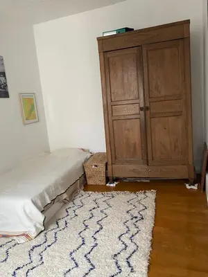 Un ou plusieurs lits dans un hébergement de l'établissement Charming Apartment Paris Saint Germain Saint Michel