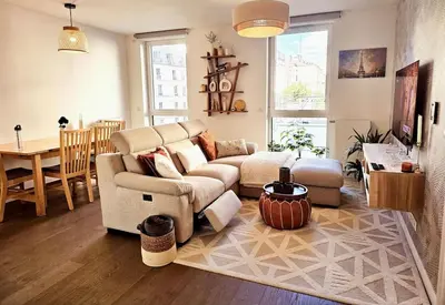 Coin salon dans l'établissement Chic appartement en plein Paris