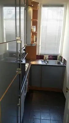 Cuisine ou kitchenette dans l'établissement Côté Arc de Triomphe