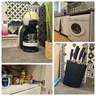 Cuisine ou kitchenette dans l'établissement Appartement Paris Mangin