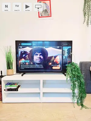 Télévision ou salle de divertissement dans l'établissement Appartement Paris Mangin