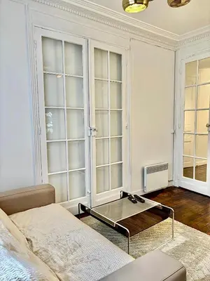 Coin salon dans l'établissement Guest House Tour Eiffel Paris