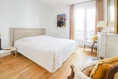 Un ou plusieurs lits dans un hébergement de l'établissement Appartement d'une chambre près de Montmartre