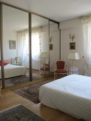Un ou plusieurs lits dans un hébergement de l'établissement Chic Paris Apartment with Local Vibe and Metro Access