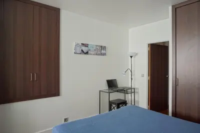 Un ou plusieurs lits dans un hébergement de l'établissement Paris Apartment Ideal for Exploring Paris