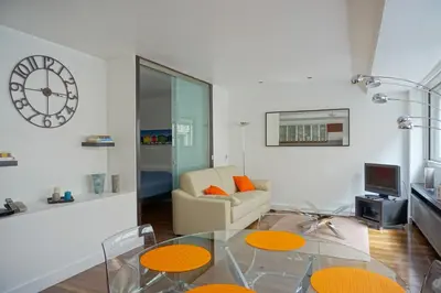 Coin salon dans l'établissement Paris Apartment Ideal for Exploring Paris