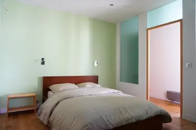 Un ou plusieurs lits dans un hébergement de l'établissement Paris 17 Apartment on Grande Armee Ideal Base for City Explorers