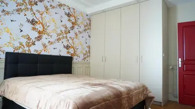 Un ou plusieurs lits dans un hébergement de l'établissement Paris 17 Apartment in Lively Village Style Poncelet District
