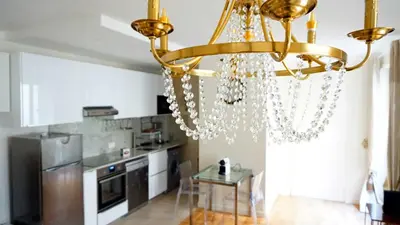 Cuisine ou kitchenette dans l'établissement Paris Apartment with Parisian Ambience in Elegant 16th Arrondissement