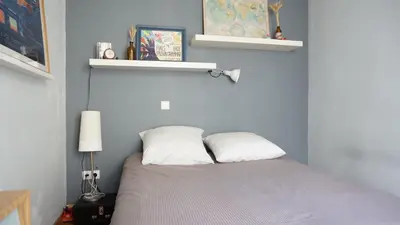 Un ou plusieurs lits dans un hébergement de l'établissement Urban Paris Apartment in Heart of Faubourg Saint Honore District