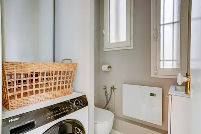 Cuisine ou kitchenette dans l'établissement SaintGermain Sojourn - Charming 2 bedroom in the Rive Gauche