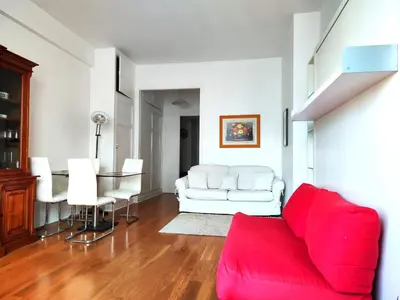 Coin salon dans l'établissement Paris 8 Elegant Apartment on Prestigious Franklin Roosevelt Avenue