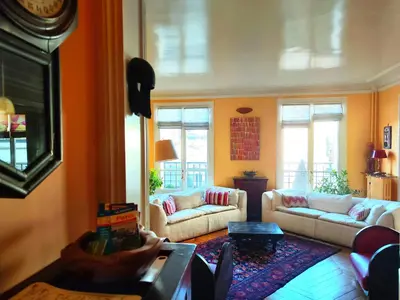Coin salon dans l'établissement Paris 16 Apartment in Quiet Residential District