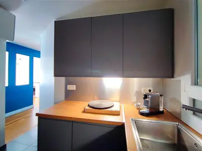 Cuisine ou kitchenette dans l'établissement Paris 16 Apartment Near Eiffel Tower and Arc de Triomphe