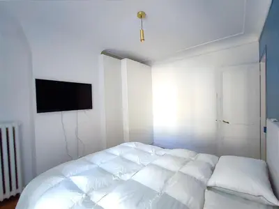 Un ou plusieurs lits dans un hébergement de l'établissement Paris 16 Apartment Near Eiffel Tower and Arc de Triomphe