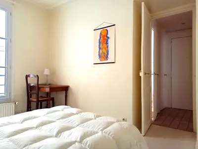 Un ou plusieurs lits dans un hébergement de l'établissement Stay in central Paris near Arc de Triomphe