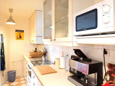 Cuisine ou kitchenette dans l'établissement Stay in central Paris near Arc de Triomphe