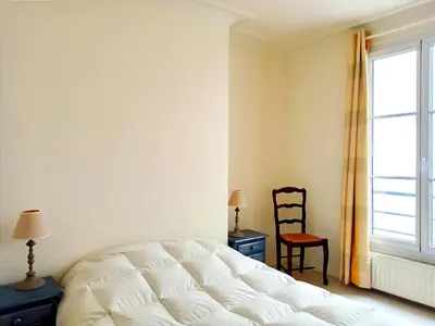Un ou plusieurs lits dans un hébergement de l'établissement Stay in central Paris near Arc de Triomphe