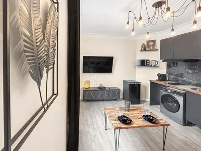 Cuisine ou kitchenette dans l'établissement Ivry-Confort
