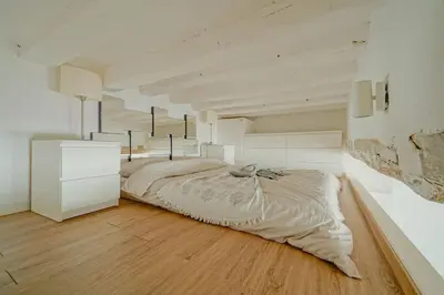 Un ou plusieurs lits dans un hébergement de l'établissement 2 BR with the Best Location of Paris in 2nd Arr