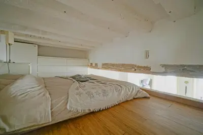 Un ou plusieurs lits dans un hébergement de l'établissement 2 BR with the Best Location of Paris in 2nd Arr