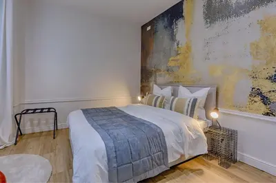 Un ou plusieurs lits dans un hébergement de l'établissement Chic Paris flat near Luxembourg garden and Odéon