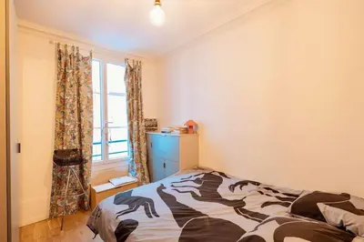 Un ou plusieurs lits dans un hébergement de l'établissement Delight in Montmartre - a true Parisian apartment
