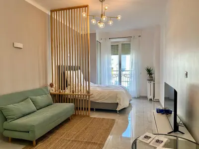 Télévision ou salle de divertissement dans l'établissement Comfortable apartment near Marais Beaubourg