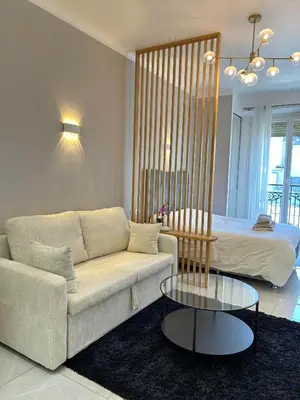 Coin salon dans l'établissement Comfortable apartment near Marais Beaubourg