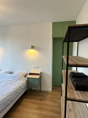 Un ou plusieurs lits dans un hébergement de l'établissement Appartement Moderne