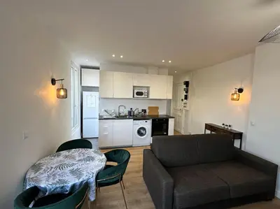Cuisine ou kitchenette dans l'établissement Appartement Moderne